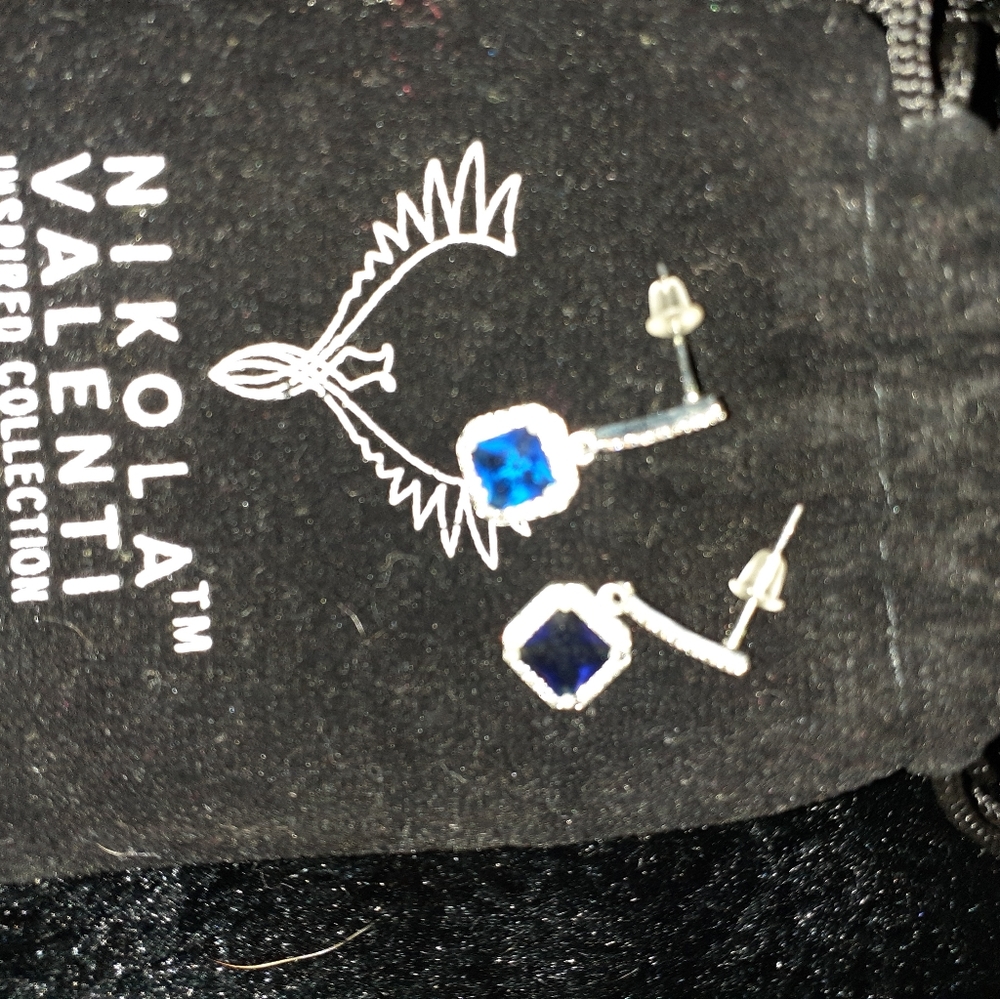 Beautiful new earrings in original bag.